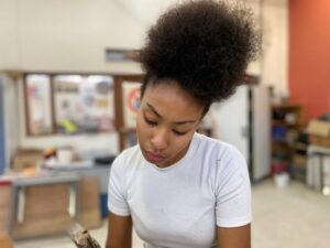 Lucynda,	Elève de 3e